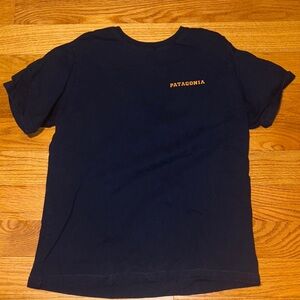 Patagonia Men's Dark Blue Tee with Orange Logo